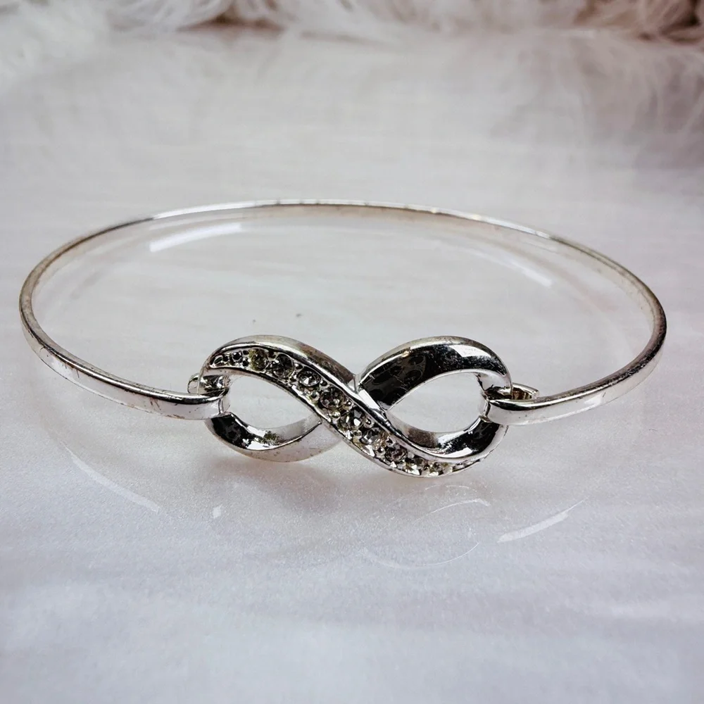 Silvertone bling accent Infinity Bracelet - Picture 5 of 11